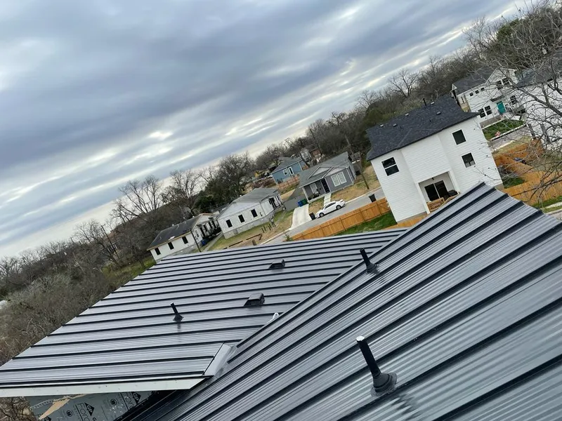 Standing seam metal roof panels with vents for Skylight Repair in Milton